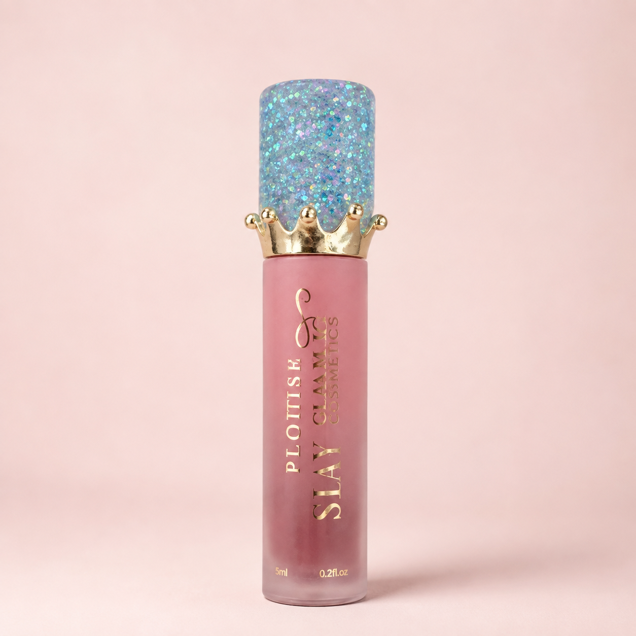 Pink lip gloss tube with a gold crown charm and blue glitter cap